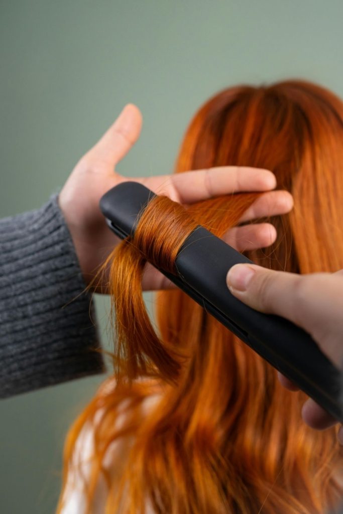 curling hair with a flat iron